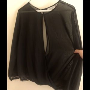 Jennifer Lopez sheer keyhole blouse